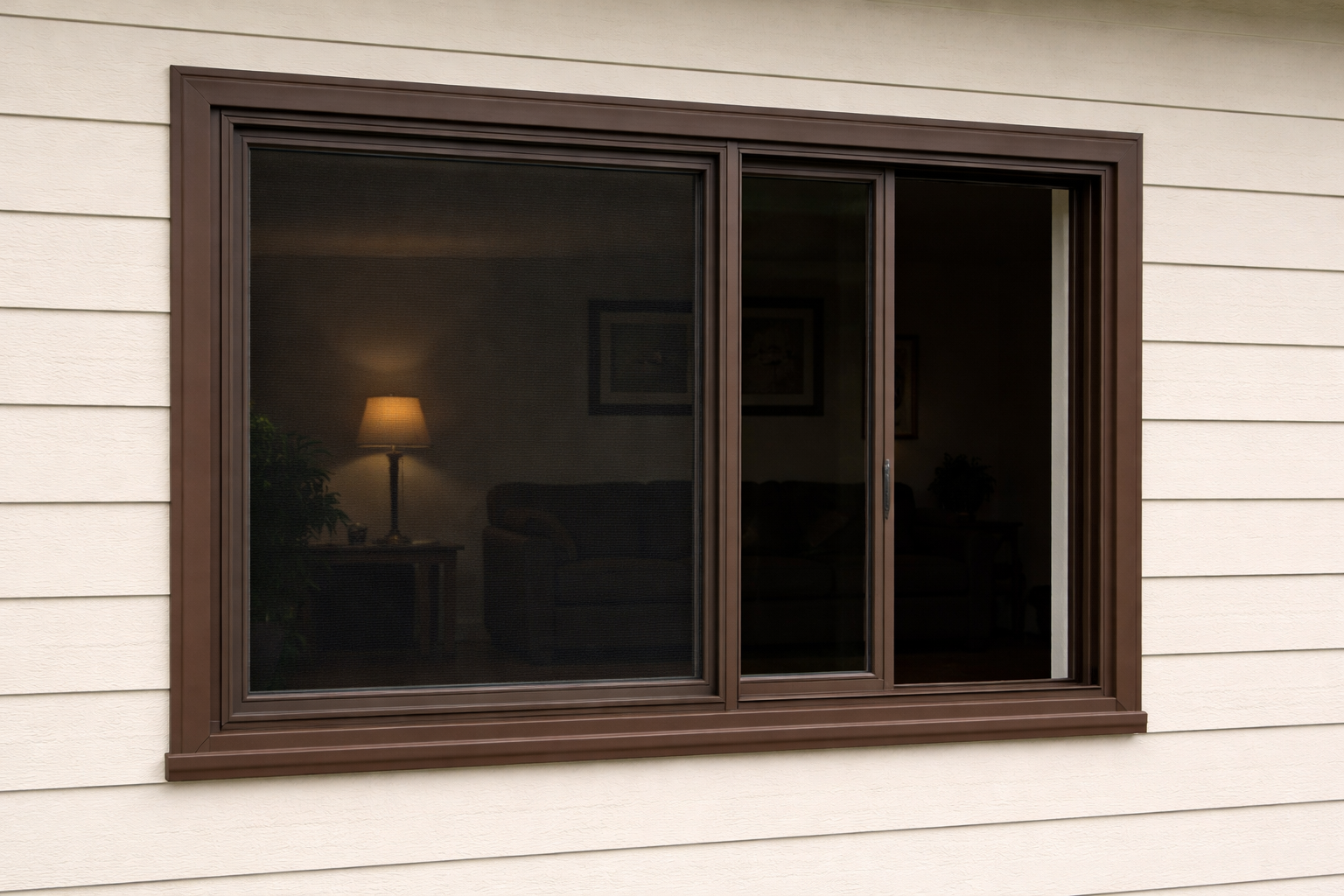 3dmodel Slider  Brown frameExterior photograph of a wide brown vinyl sliding window on a cream colored home right panel is shifted to overlap the left-1