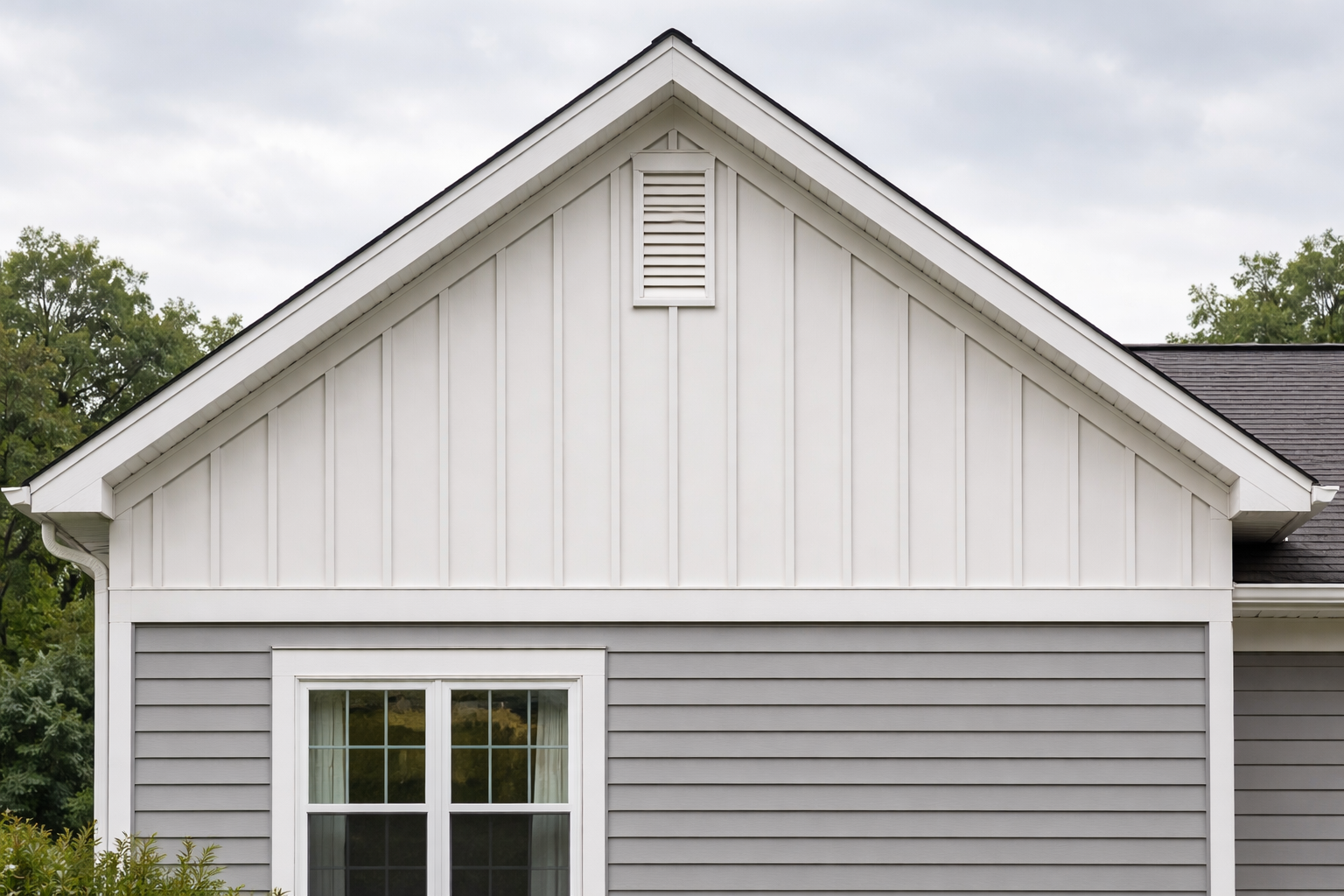 Vinyl Siding Contrast on Residential Home Gable End