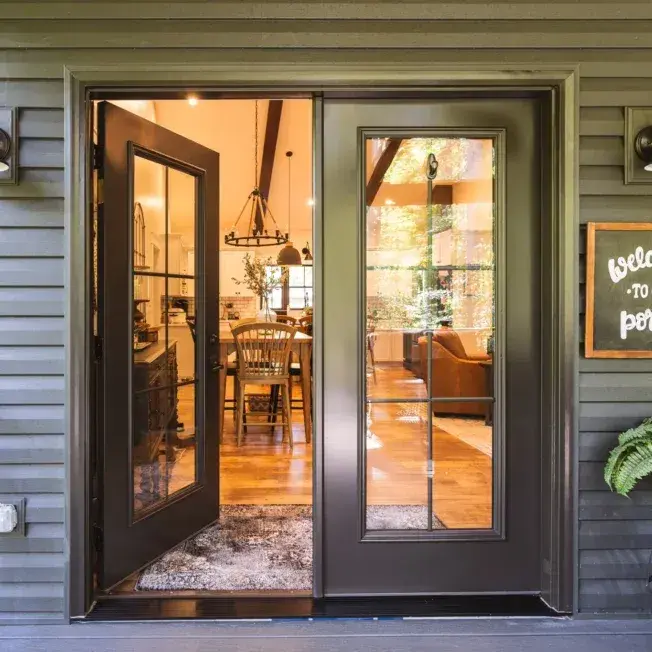 Legacy-Steel-460-French-Doors-in-Rustic-Bronze-with-Internal-Grids.jpg-652x652