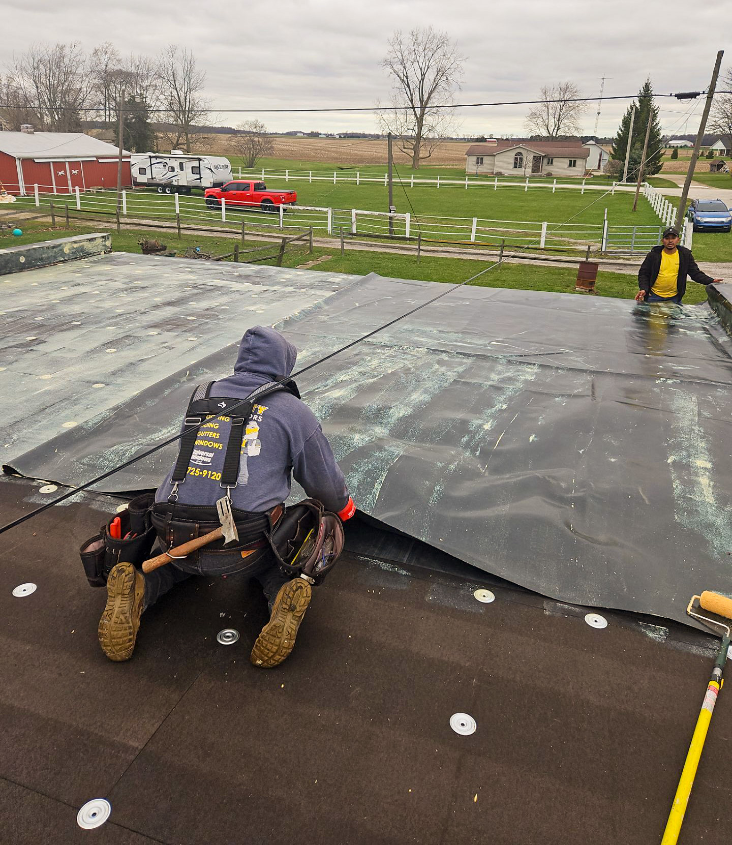 Flat roof 7 - Integrity Home Exteriors - Roof - Siding - Windows - Gutters - Doors - Lawn Care