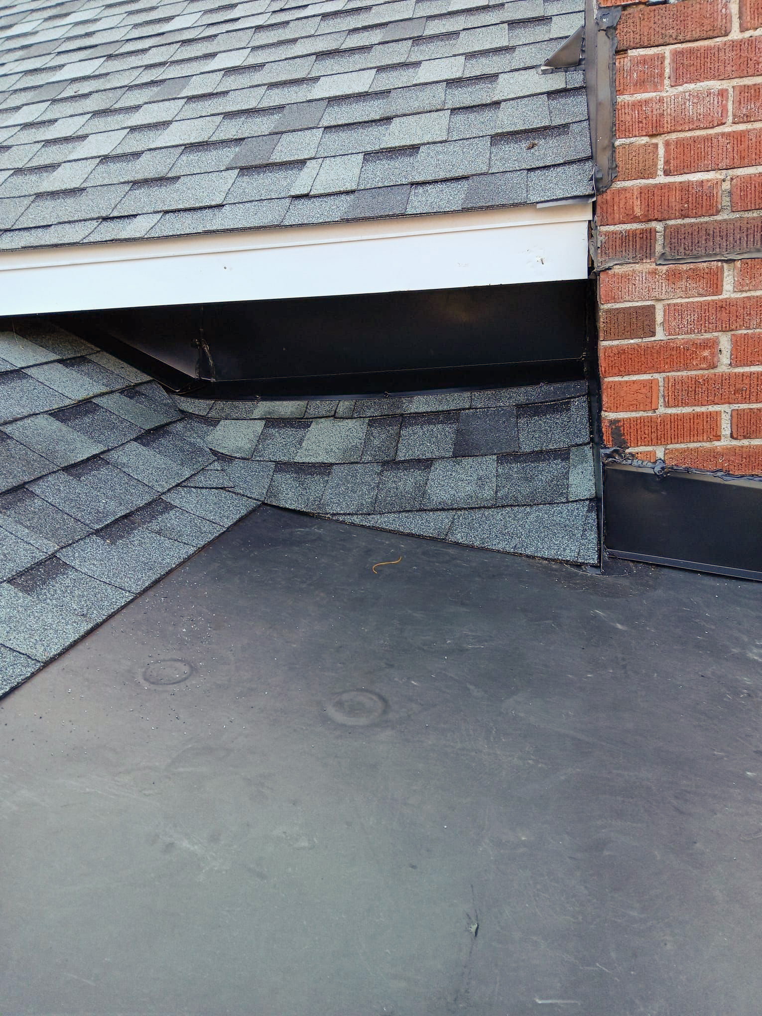 Flat roof 9 - Integrity Home Exteriors - Roof - Siding - Windows - Gutters - Doors - Lawn Care